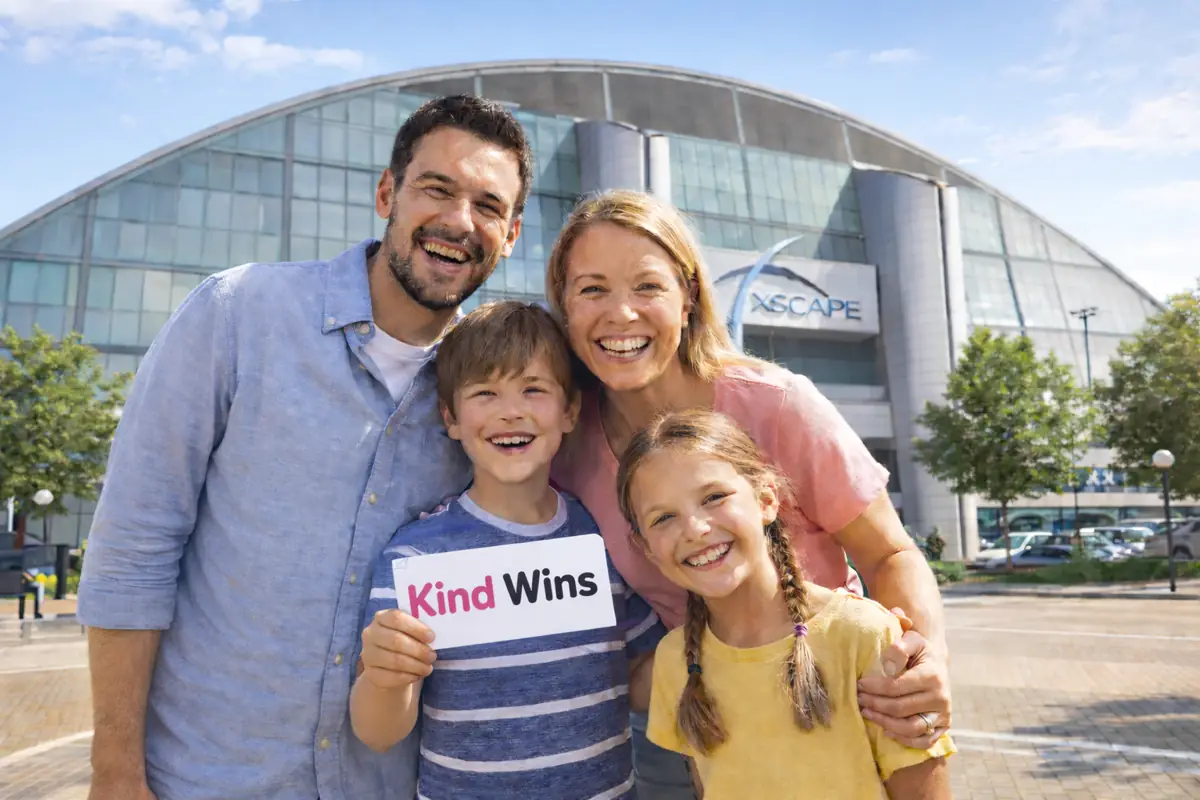 A family enjoying a Kind Wins prize experience